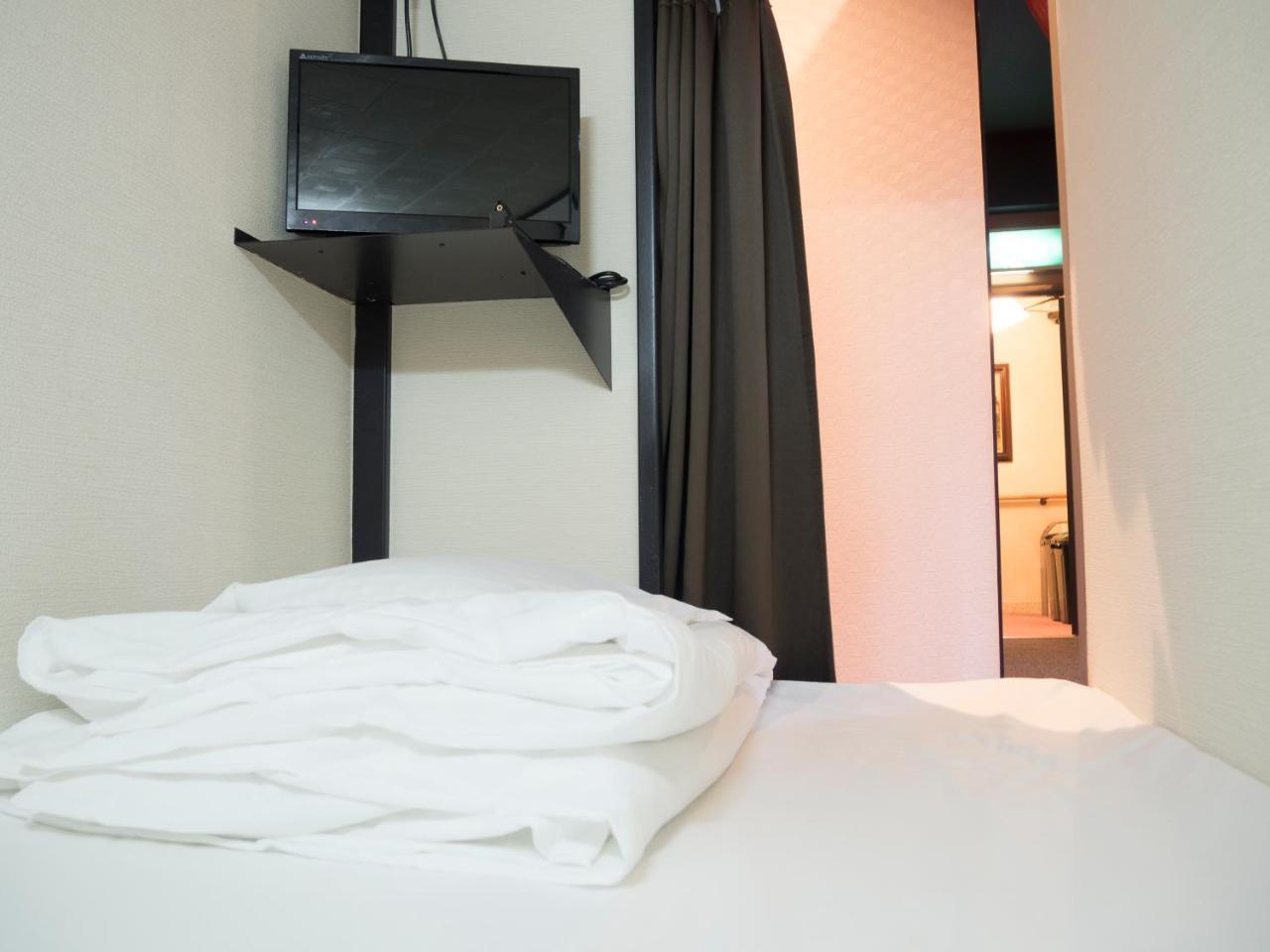 Capsule Hotel Hatagoya Tokyo Exterior photo
